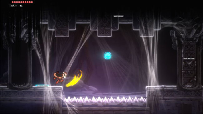 Screenshot of  “Balam and the Spirit Within” gameplay. Balam, girl in jaguar mask, is in a dark room, near a floor of spikes.