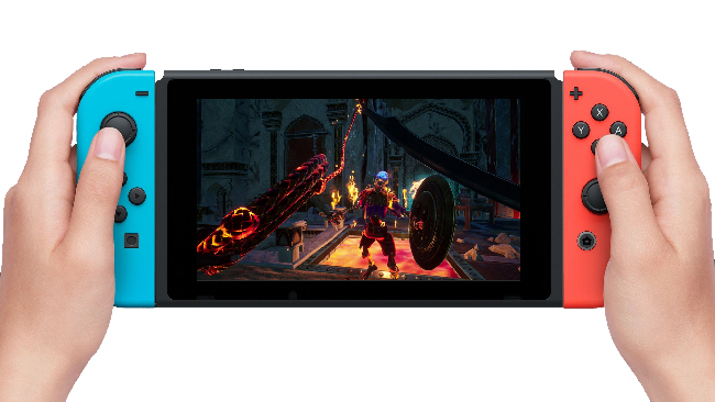 “City of Brass” gameplay on the Nintendo Switch. It looks like a pair of hands holding a red-and-blue console. On the screen is an image of a first-person view showing the glimpses of the player’s weapons, a whip and sword. The first-person view also includes a confrontation against a skeleton with a shield, in a fantasy Arabian desert city at night.